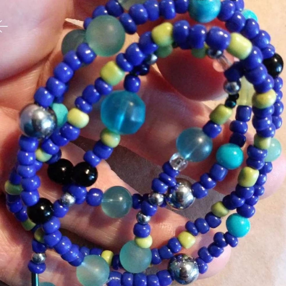 4 handmade stackable blue beaded bracelets